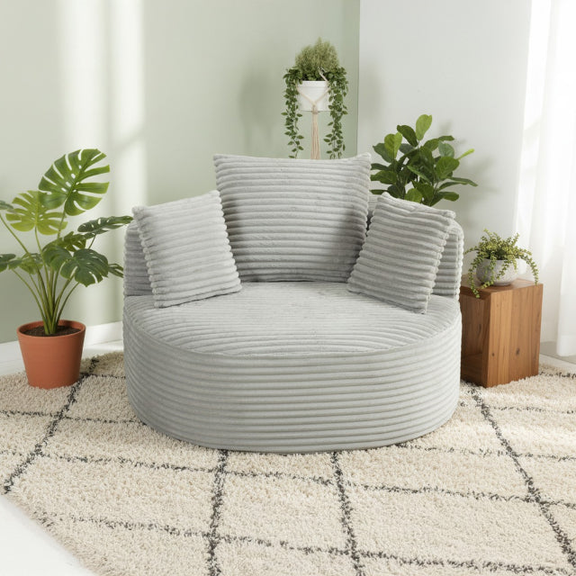 COMPRESSED ROUND OVERSIZED BARREL CHAIR